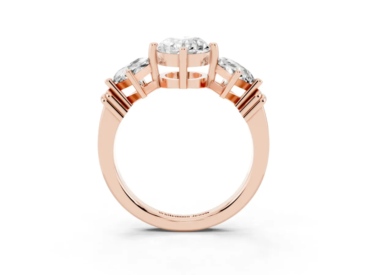 Three-Stone Oval Cut and Princess Cut Diamond Ring with Channel Band and Four-Prong Setting Rose gold