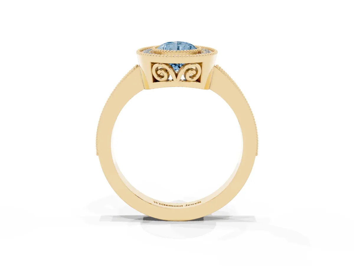 Fancy Blue Pear Cut Cut Halo Diamond Ring with Pavé Band and Milgrain Prong Setting Yellow gold