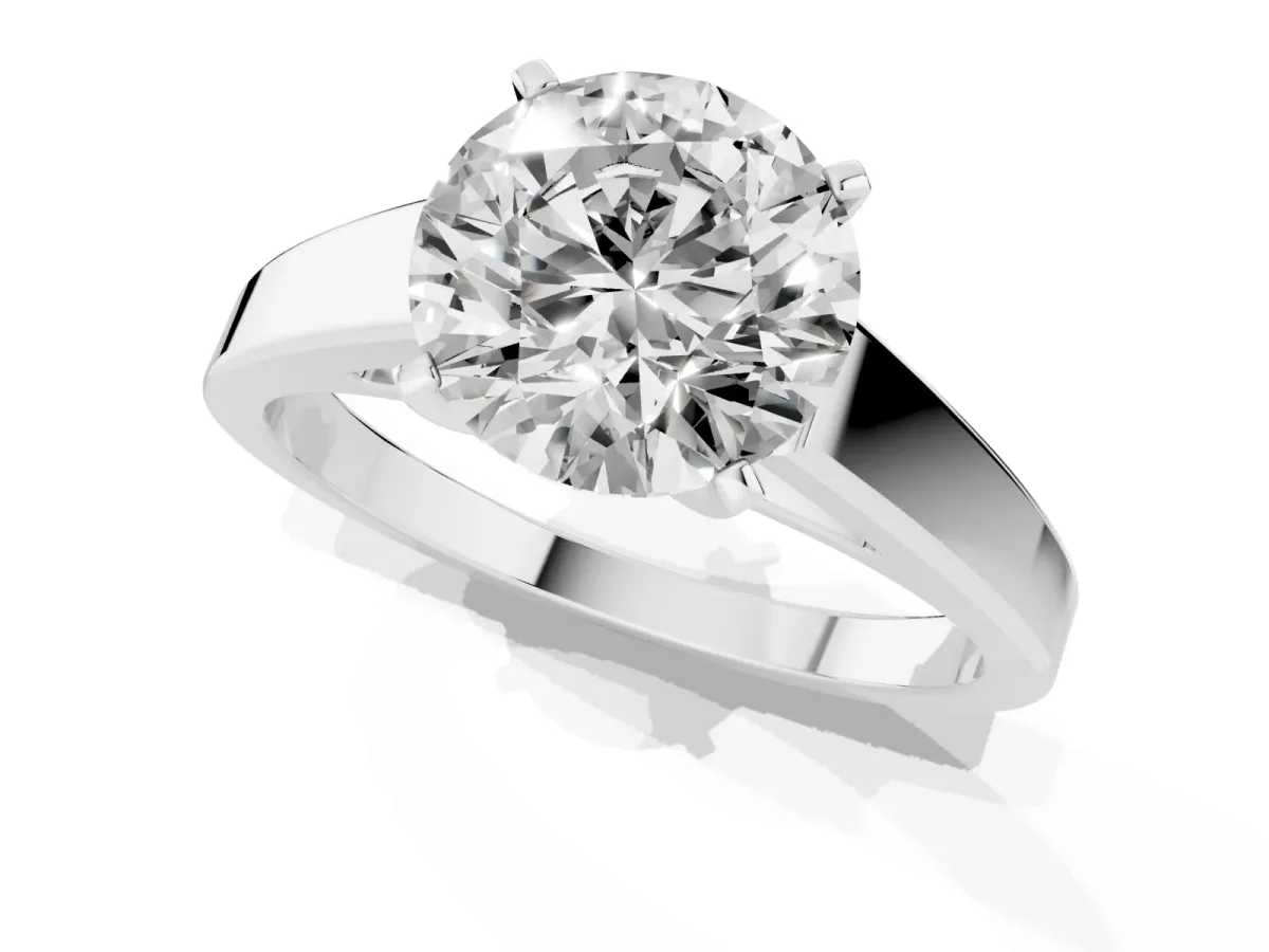 Round Cut Solitaire Engagement Ring with Four-Prong Setting and Tapered Band White gold