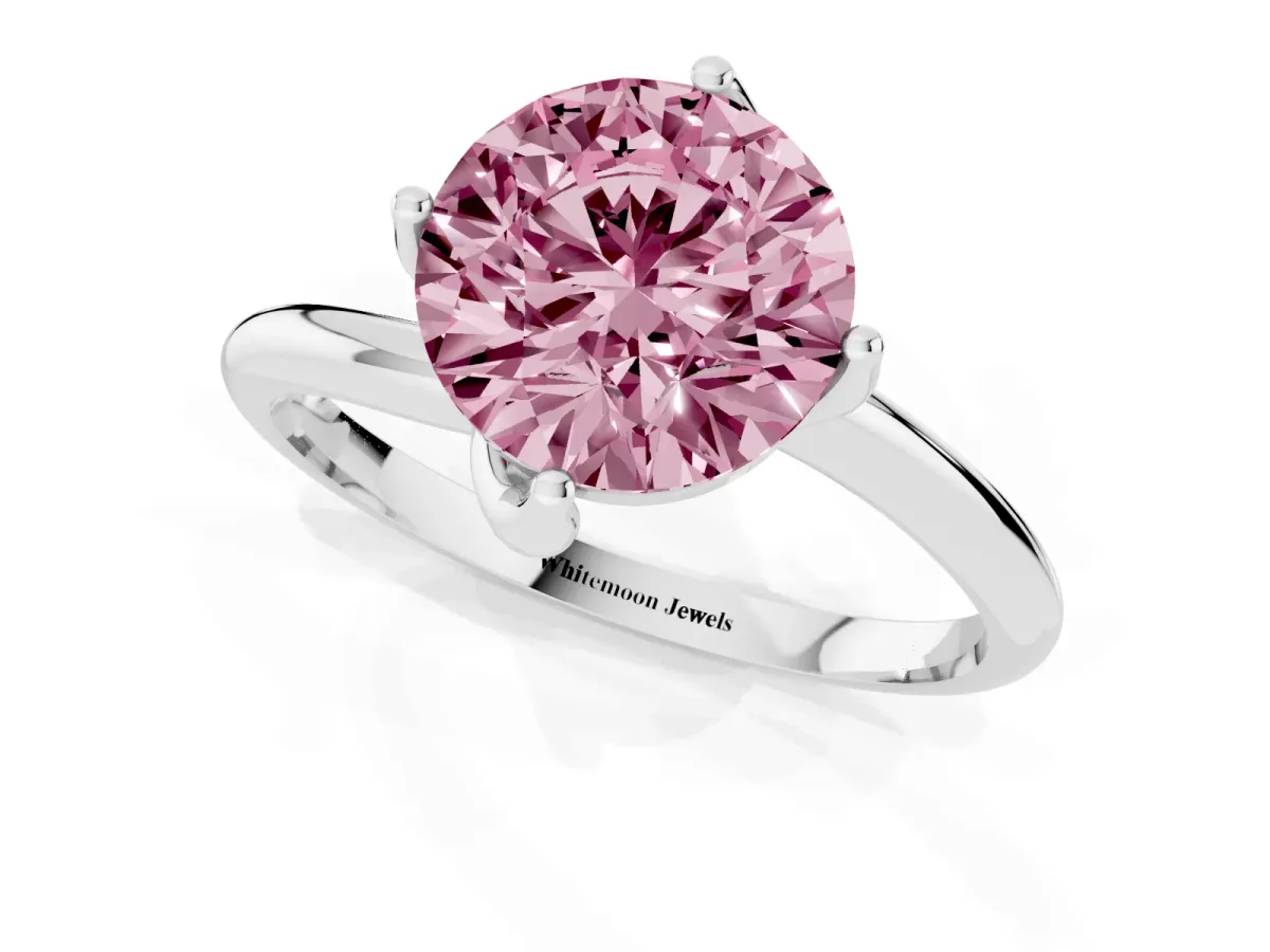 Fancy Pink Round Cut Diamond Solitaire Engagement Ring with Four-Prong Setting and Classic Band Silver