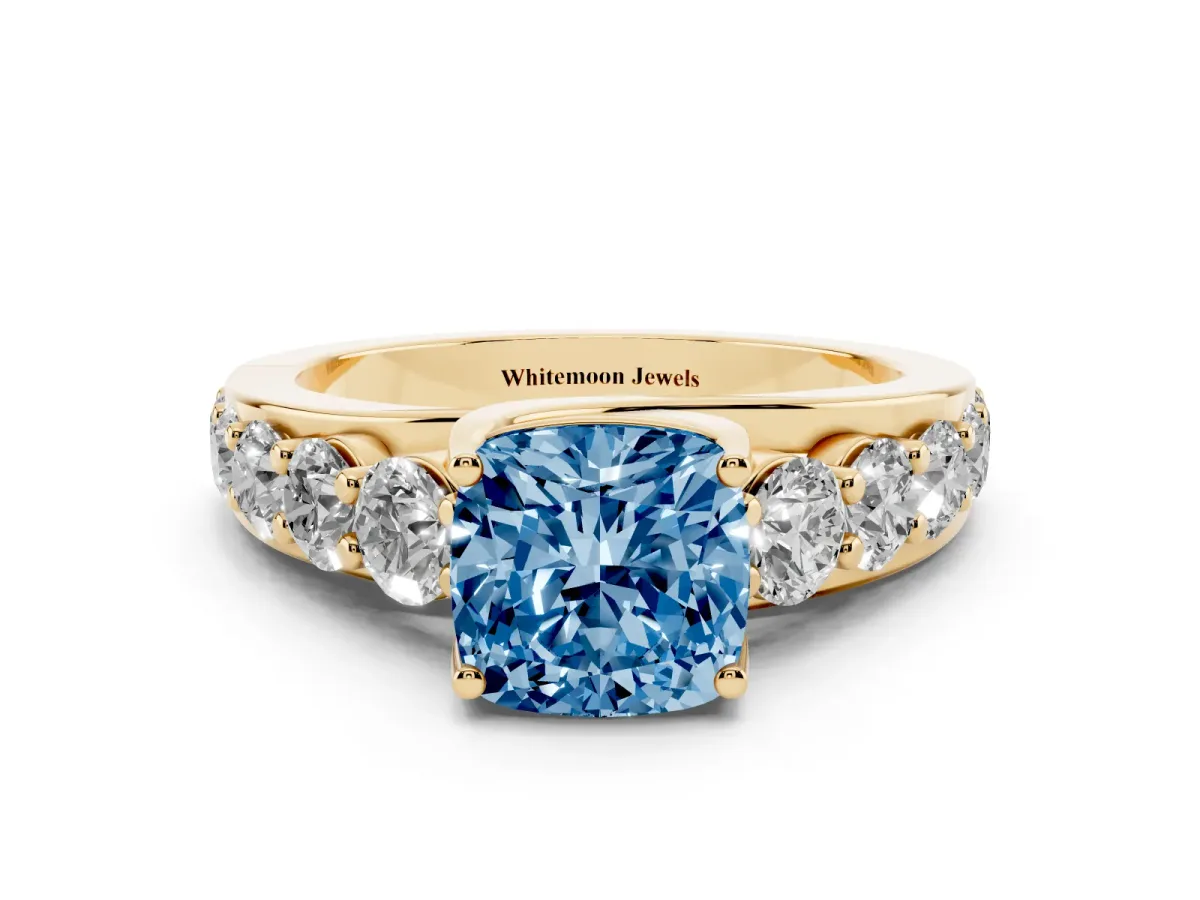 Fancy Blue Cushion Cut Diamond Engagement Ring with Pavé Band and Four-Prong Setting Yellow gold