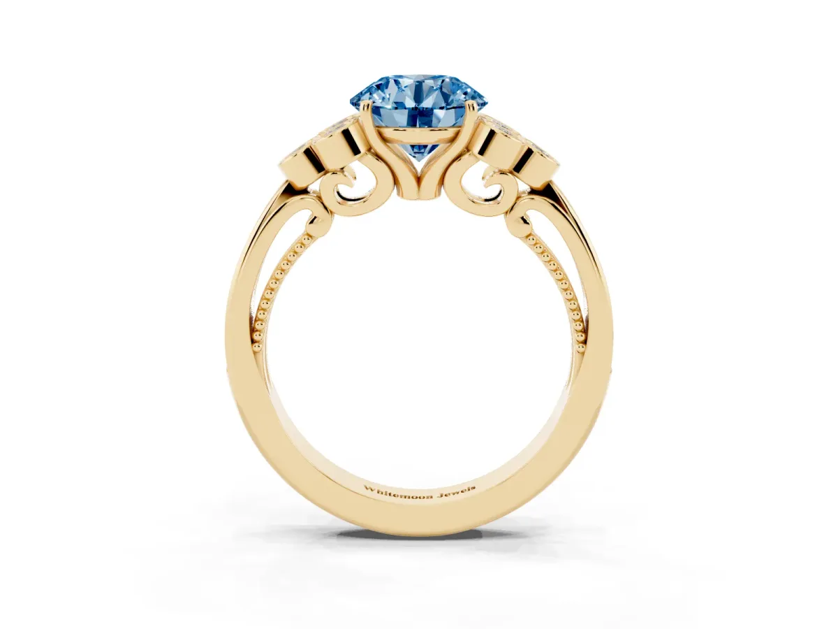 Fancy Blue Round Cut Cut Diamond Engagement Ring with Bezel Set Round Side Stones and Prong Setting Yellow gold