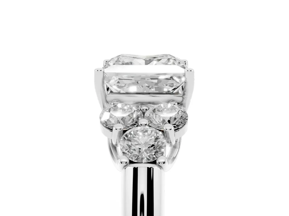 Princess Cut Cut Diamond Cluster Ring with Round Accent Stones and Prong Setting on a Classic Band White gold