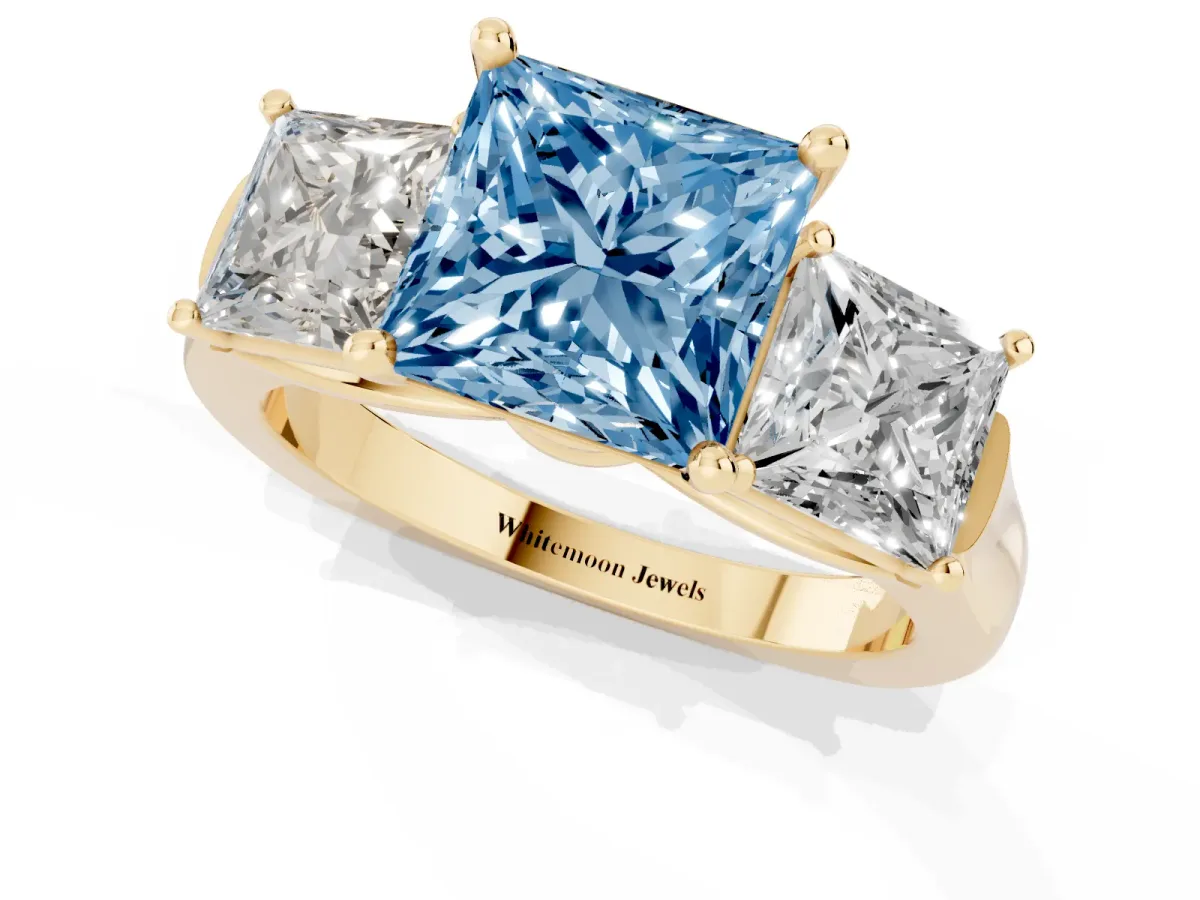Fancy Blue Three-Stone Princess Cut Brilliant Diamond Trellis Ring with Comfort Fit Band Yellow gold