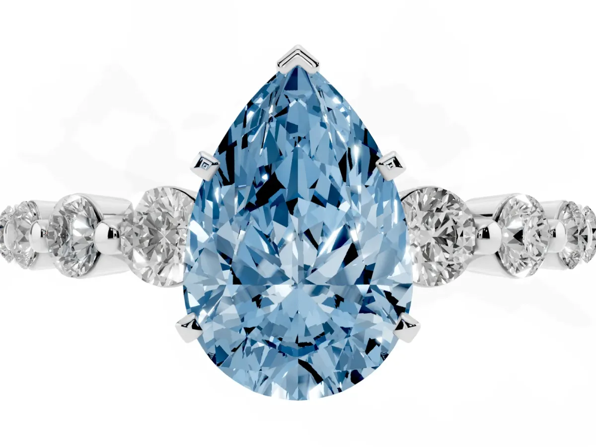 Fancy Blue Pear Cut Solitaire Diamond Ring with Pave Band and Four-Prong Setting Silver