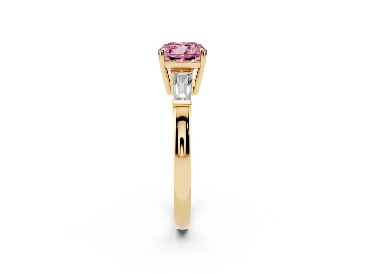 Fancy Pink Cushion Cut Diamond Three-Stone Ring with Tapered Baguette Side Stones and Prong Setting Yellow gold