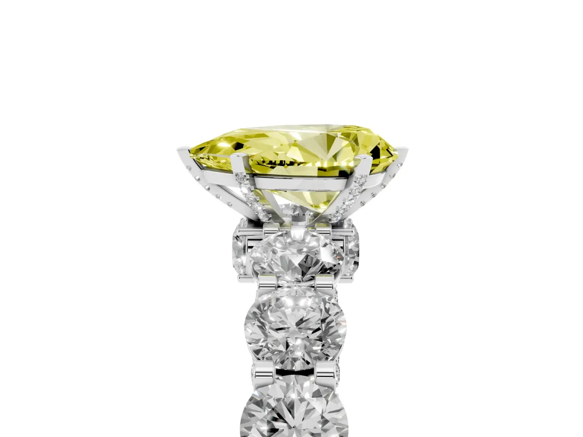 Fancy Yellow Pear Cut Diamond Side Stone Engagement Ring with Four-Prong Setting White gold