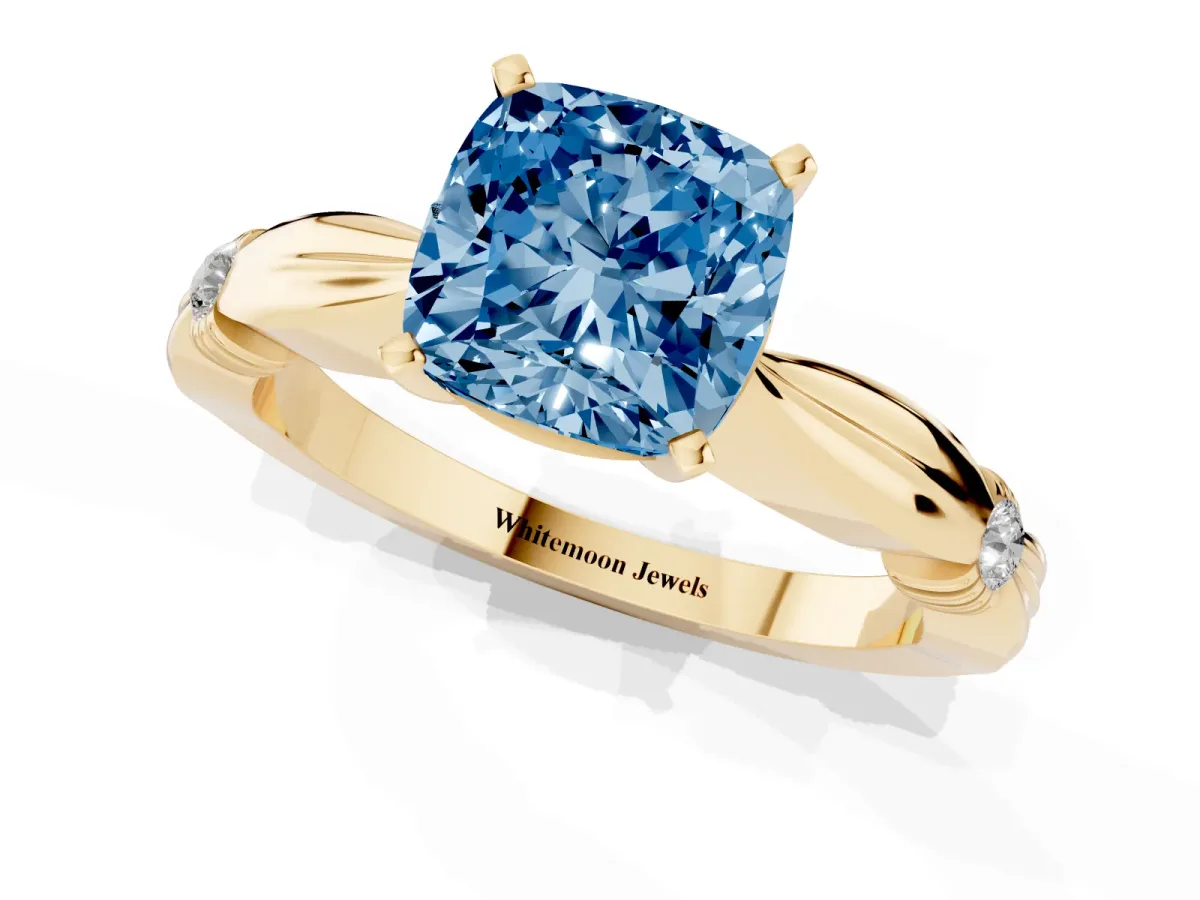 Fancy Blue Cushion Cut Solitaire Diamond Twisted Band with Four-Prong Setting Yellow gold