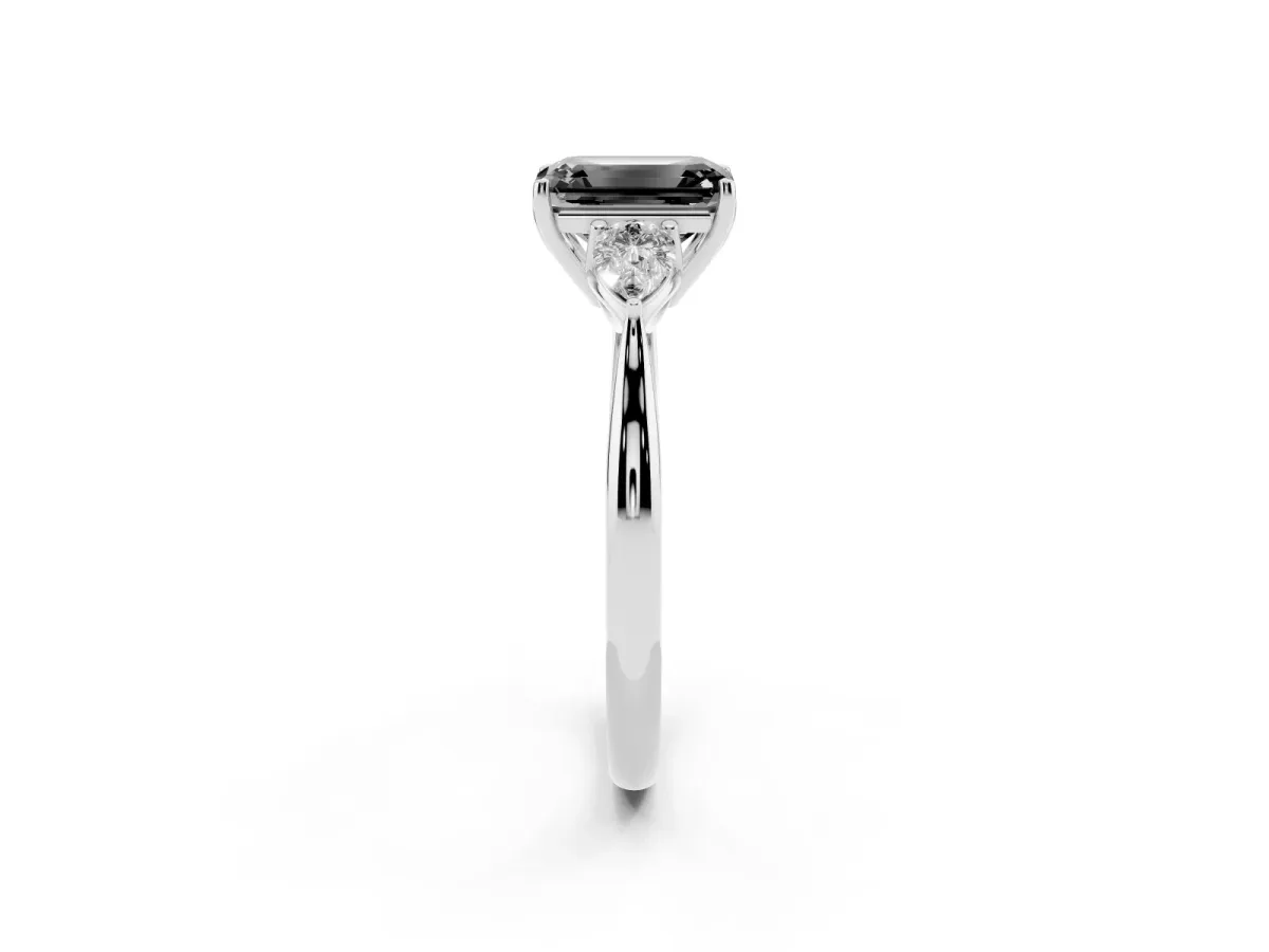 Fancy Black Three-Stone Emerald Cut Brilliant Diamond Solitaire Ring with Tapered Band and Four-Prong Setting Platinum