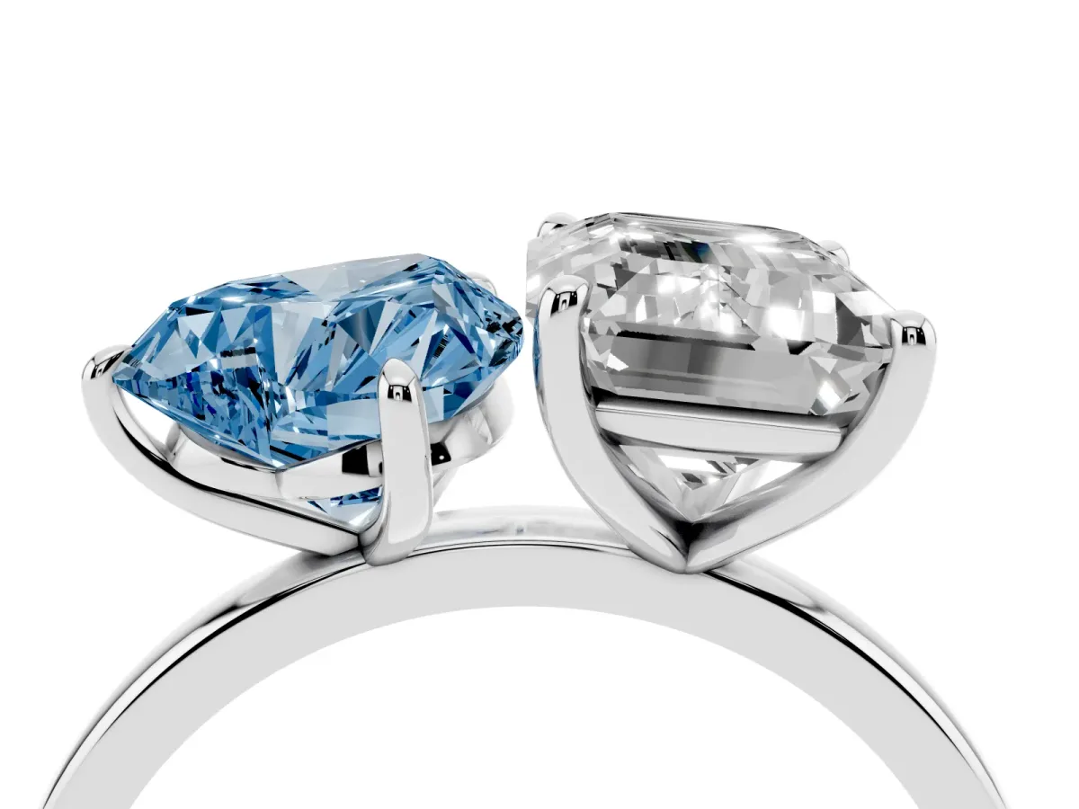 Fancy Blue Heart Cut and Emerald Cut Toi Moi Ring with Prong Setting Silver