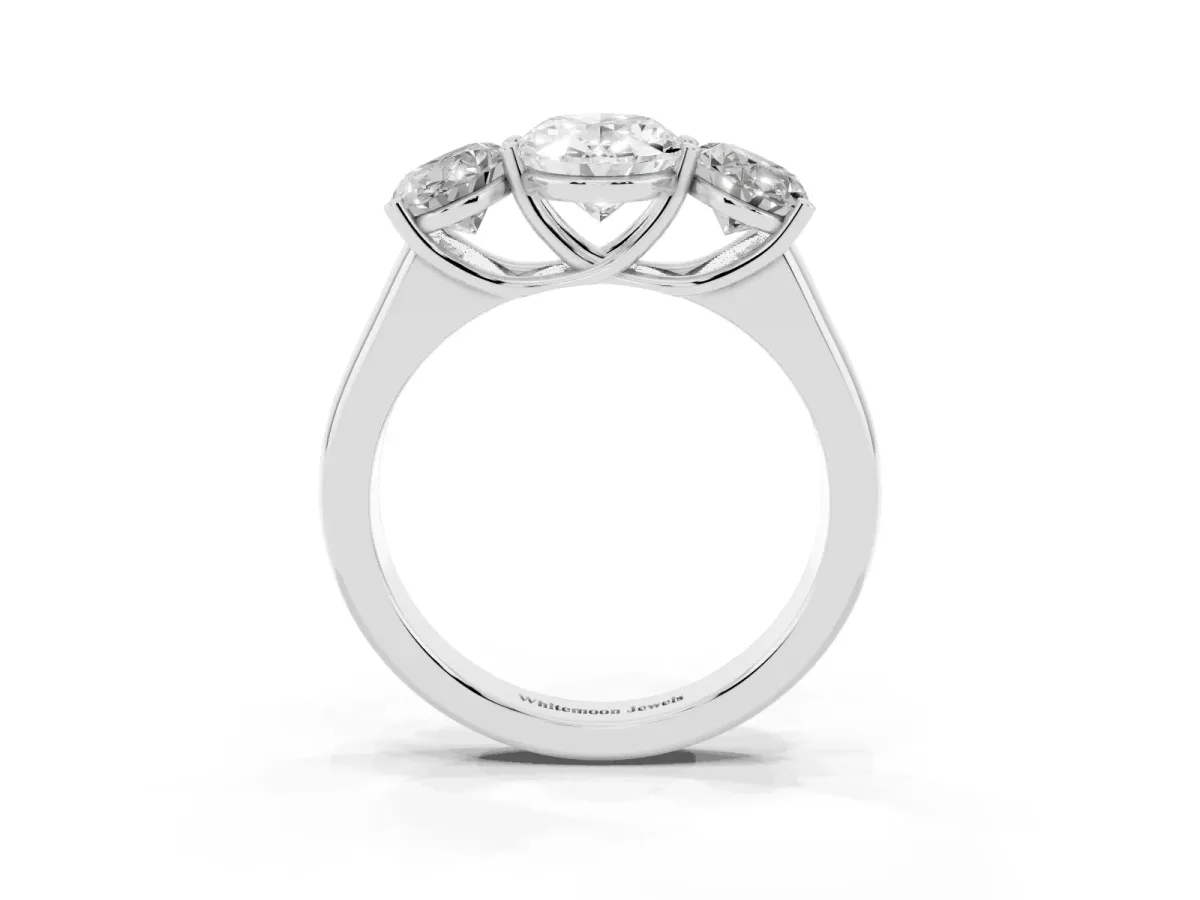 Oval Cut Three-Stone Diamond Ring with Prong Setting on a Classic Band Silver