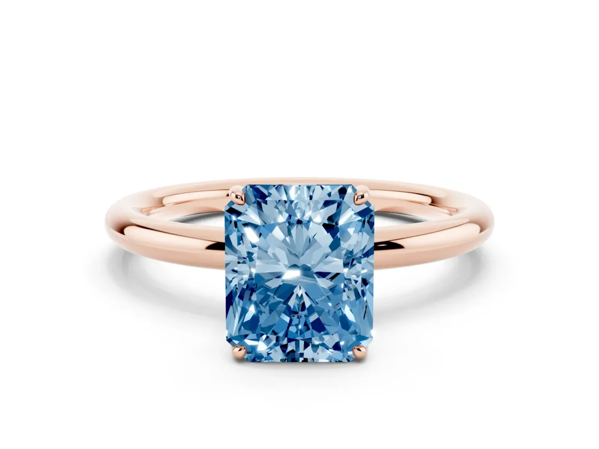 Fancy Blue Radiant Cut Solitaire Diamond Ring with Four-Prong Setting on a Plain Band Rose gold