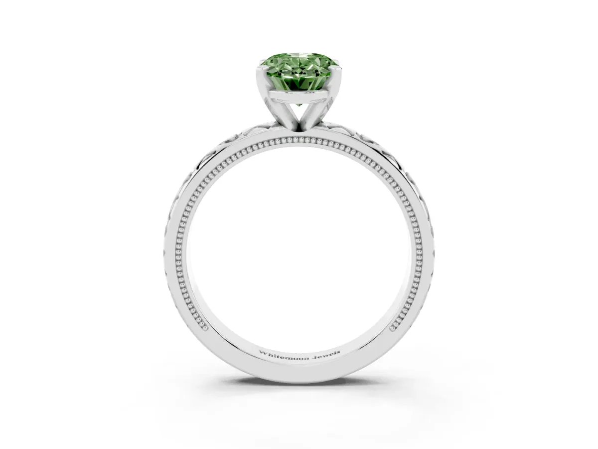 Fancy Green Oval Cut Solitaire Diamond Engagement Ring with XO Engraved Band and Four-Prong Setting Silver