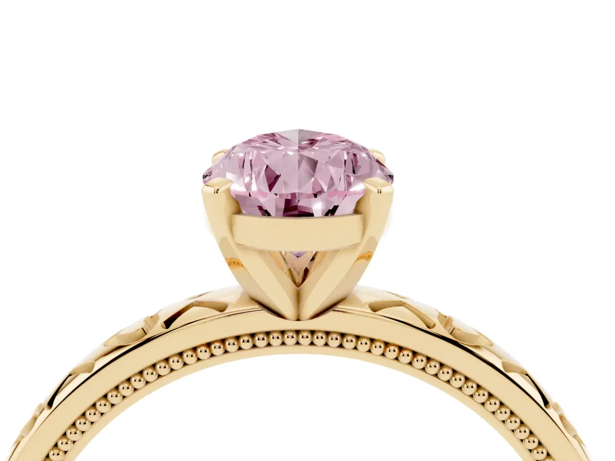 Fancy Pink Pear Cut Solitaire Diamond Engagement Ring with XO Engraved Band and Four-Prong Setting Yellow gold