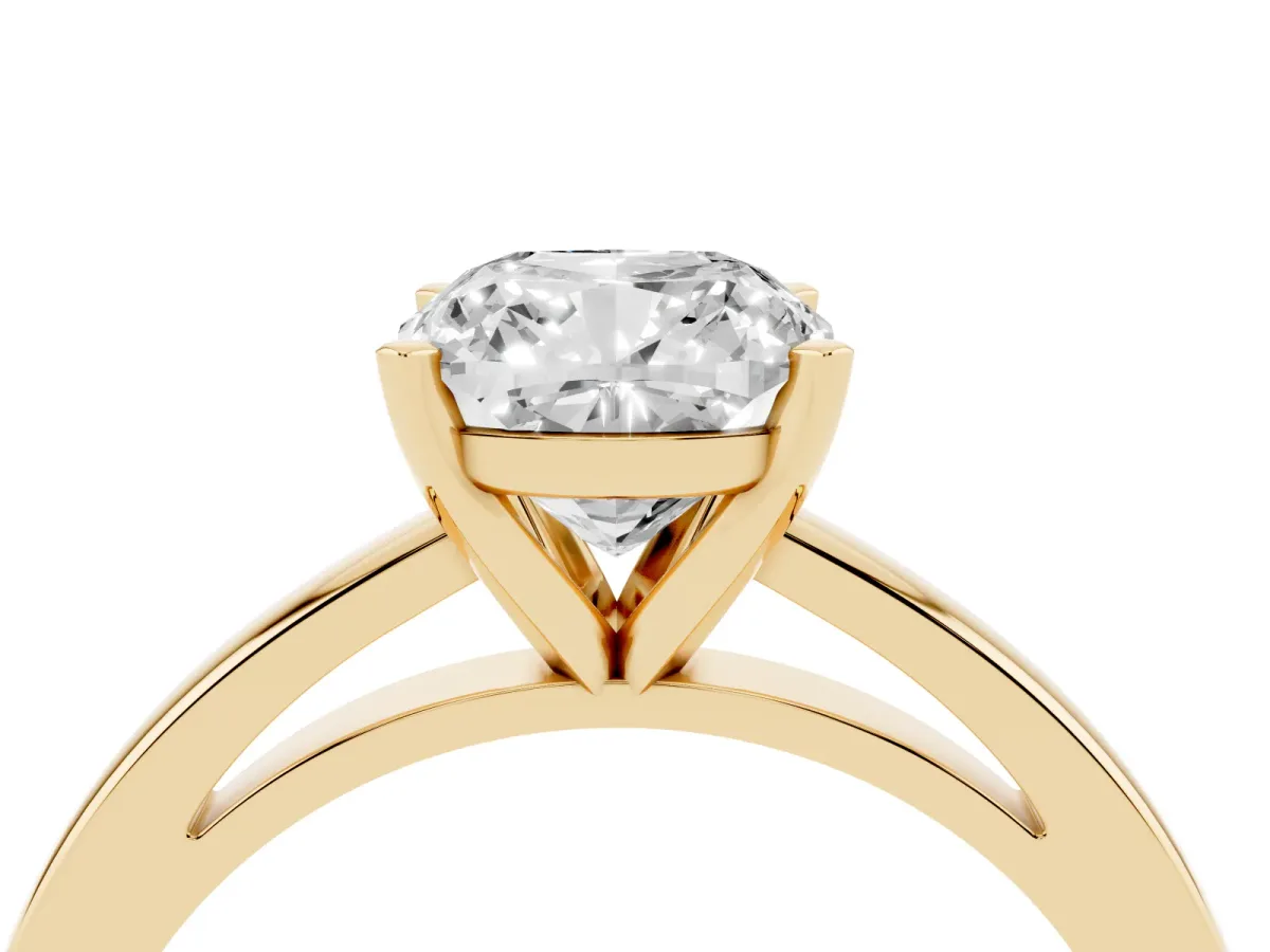 Cushion Cut Solitaire Diamond Engagement Ring with Four-Prong Setting on a Classic Band Yellow gold