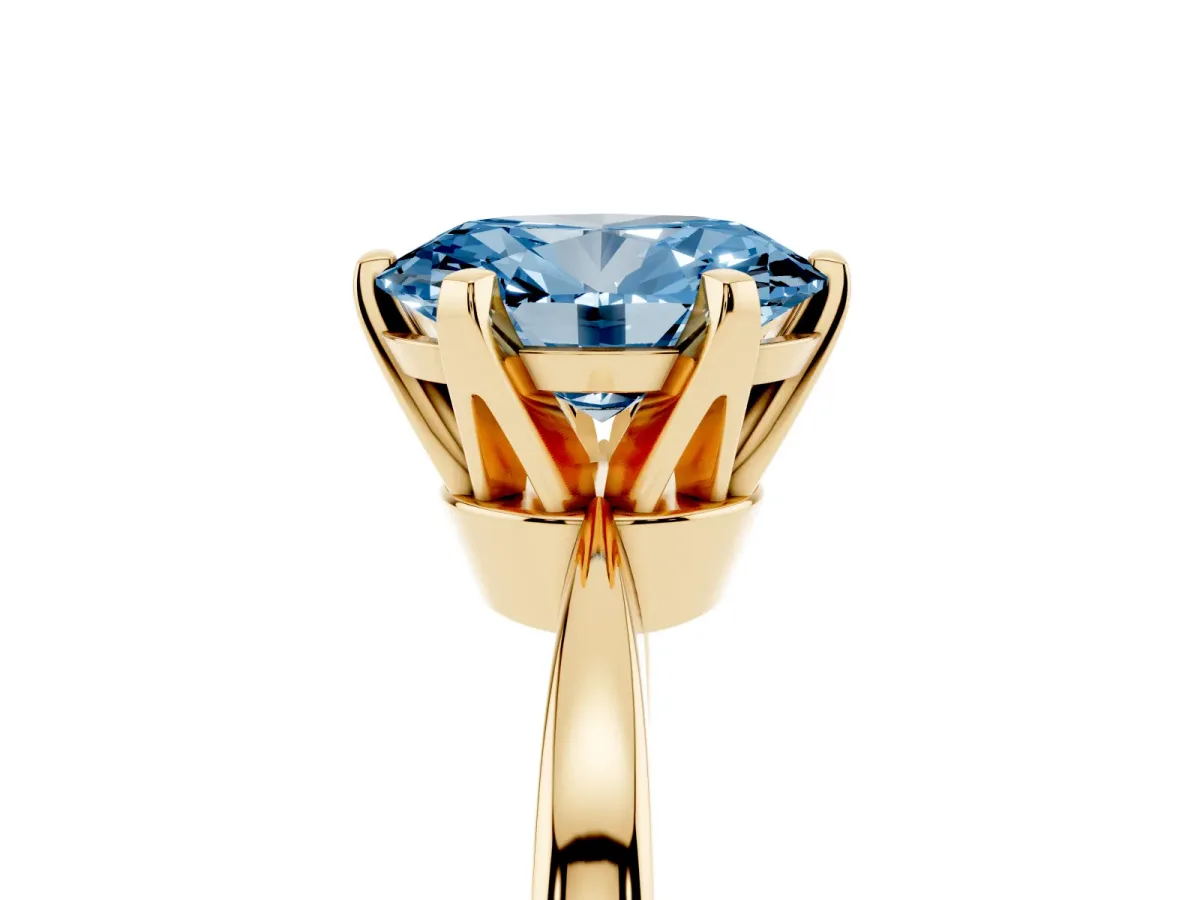 Fancy Blue Oval Cut Solitaire Engagement Ring with Six-Prong Setting and Tapered Band Yellow gold