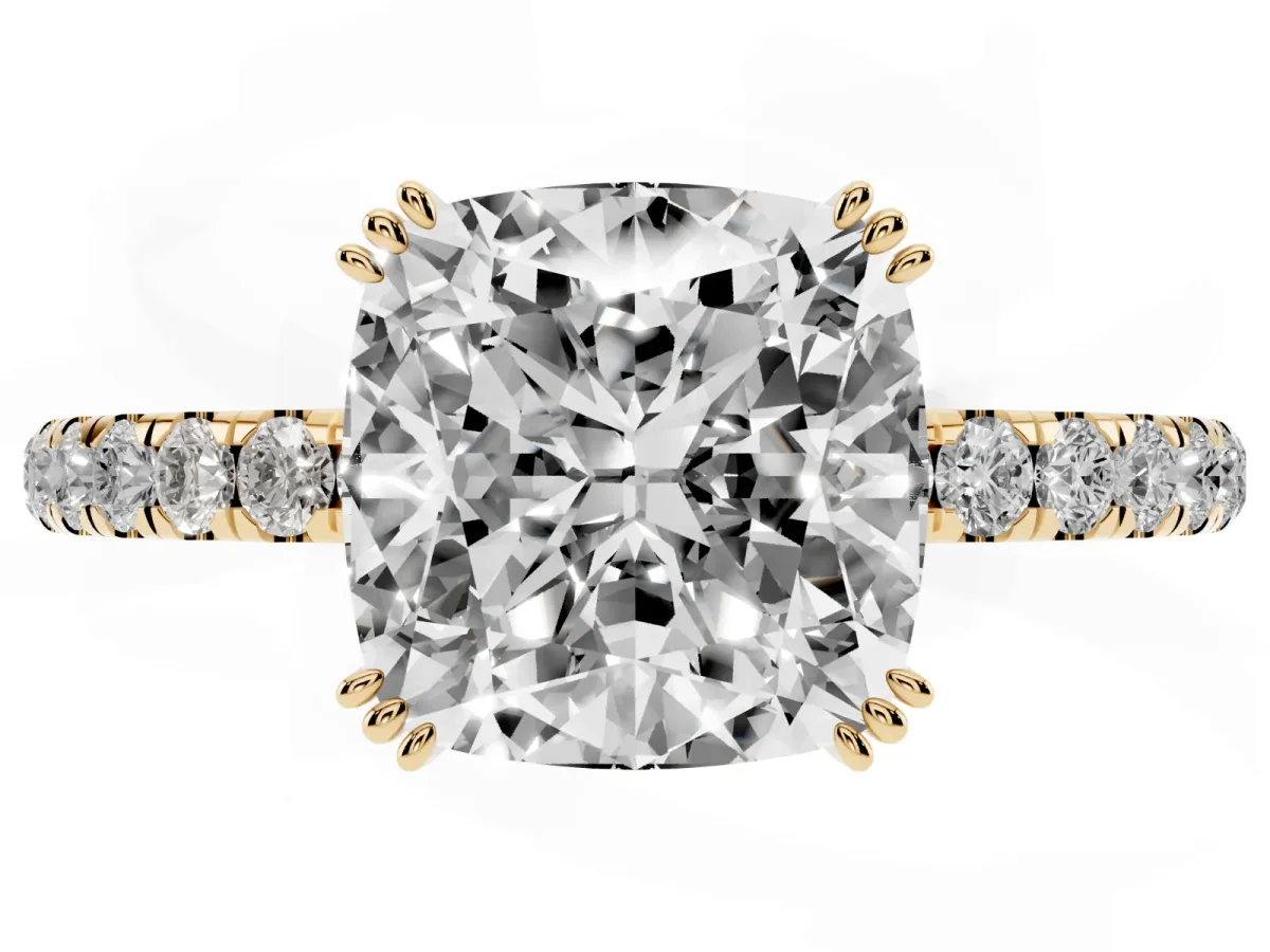 Cushion Cut Brilliant Solitaire with Pavé Band and Claw Prong Setting Yellow gold
