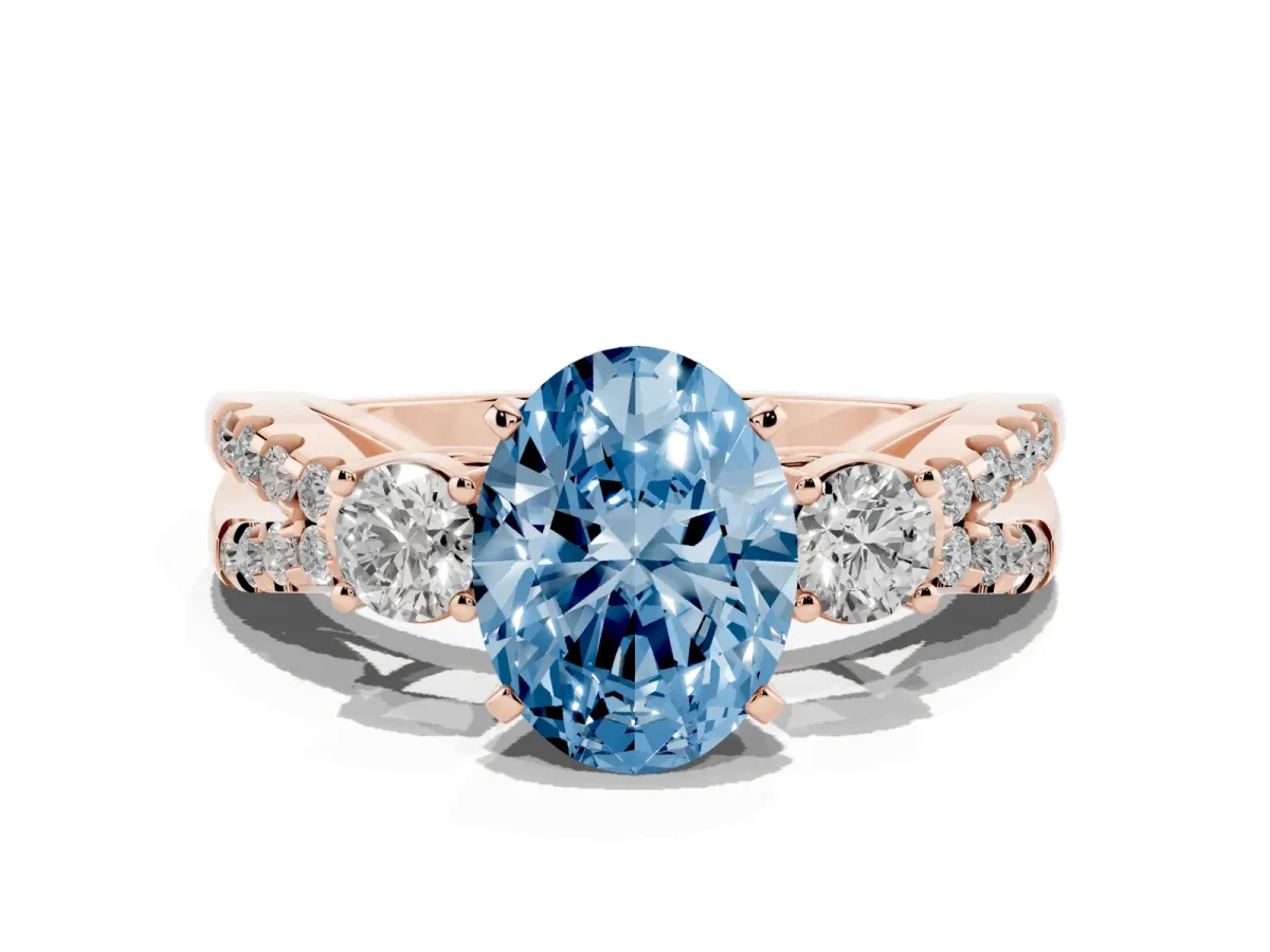 Fancy Blue Oval Cut Diamond Three-Stone Ring with Pavé Split Shank and Four-Prong Setting Rose gold