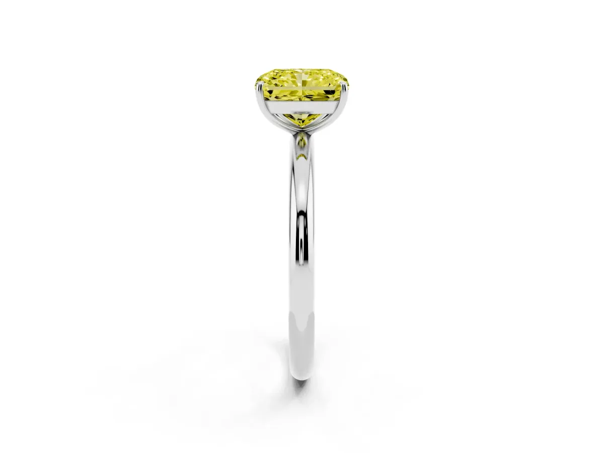 Fancy Yellow Radiant Cut Solitaire Diamond Ring with Four-Prong Setting on a Plain Band Platinum