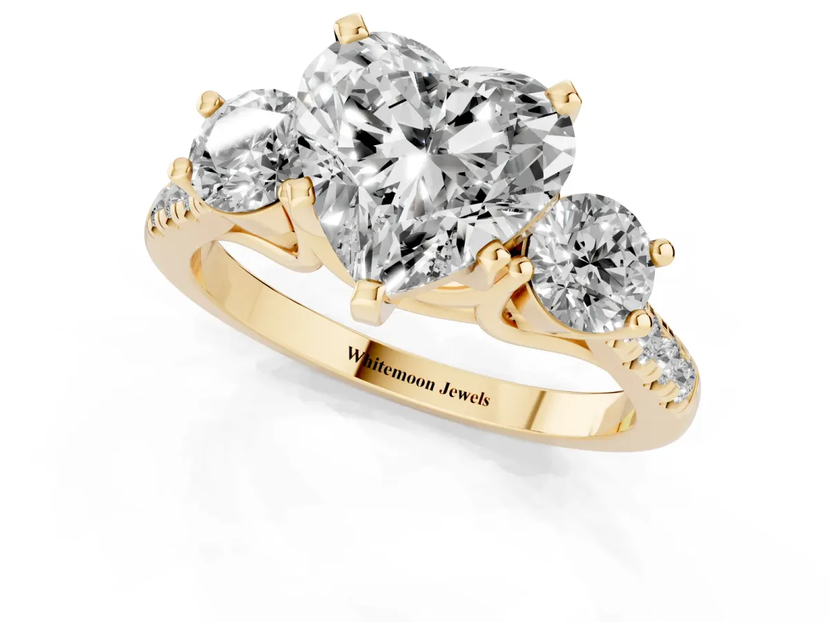 Three-Stone Heart Cut Diamond Pavé Band with Four-Prong Setting Yellow gold