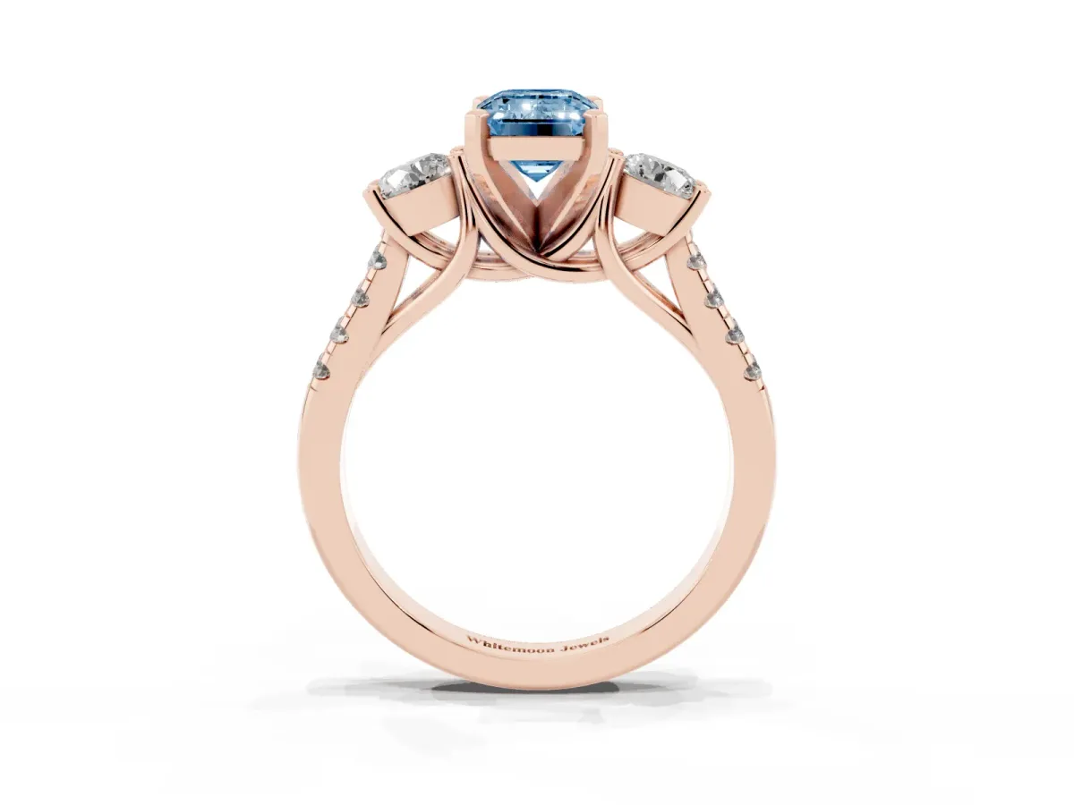Fancy Blue Three-Stone Emerald Cut Diamond Pavé Band with Four-Prong Setting Rose gold