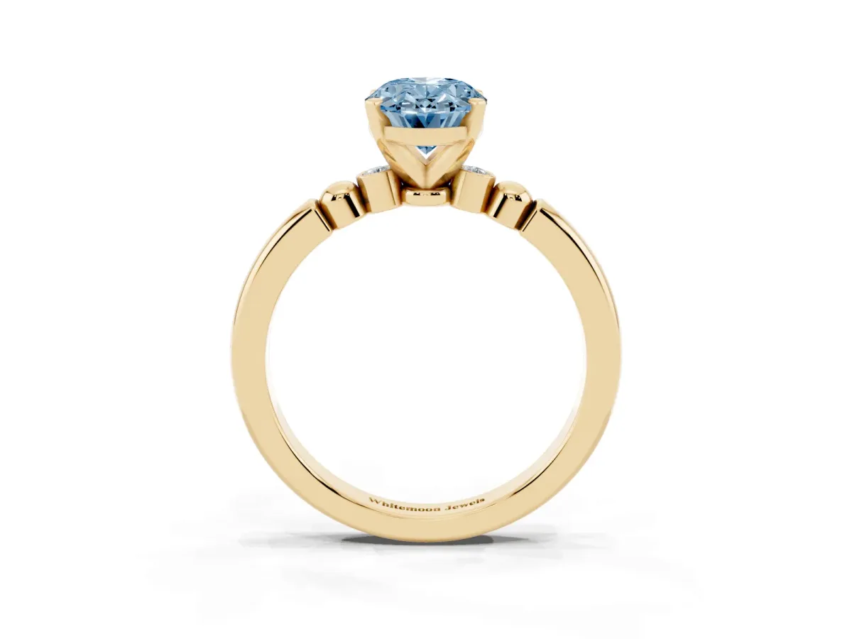 Fancy Blue Oval Cut Solitaire Beaded Band with Four-Prong Setting Yellow gold