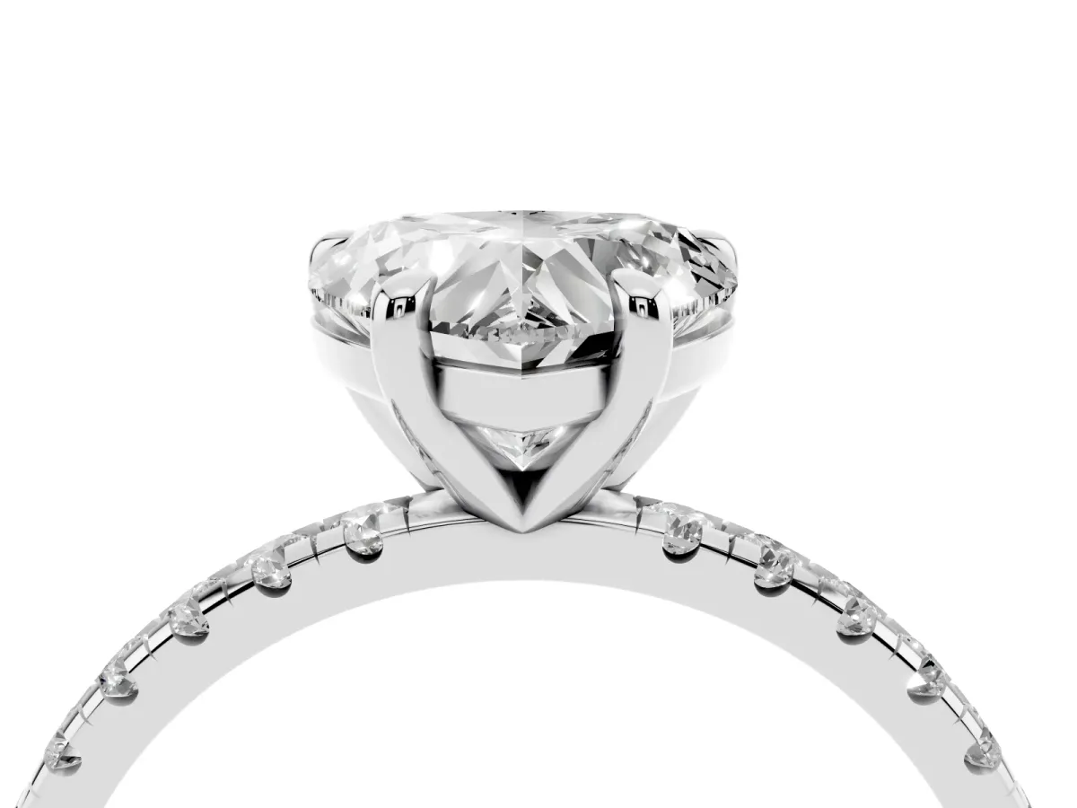 Heart Cut Diamond Brilliant Solitaire Ring with Pavé Band and Four-Prong Setting Silver