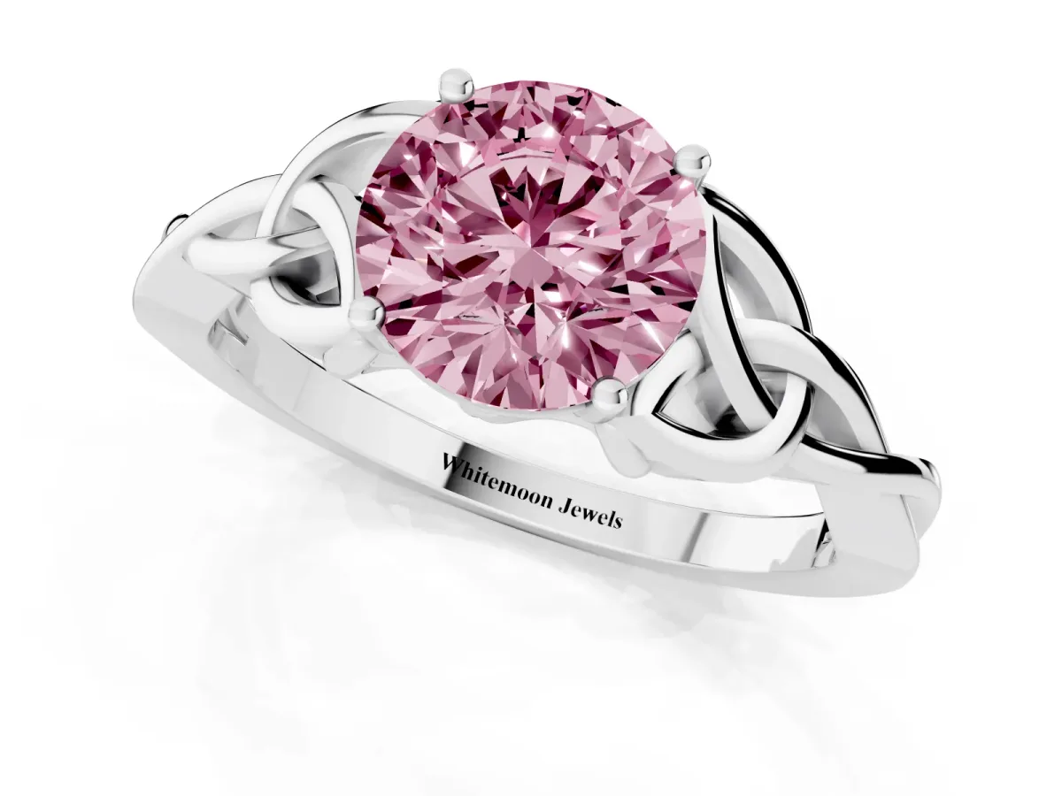 Fancy Pink Round Cut Diamond Solitaire Engagement Ring with Celtic Knot Band and Four-Prong Setting Silver