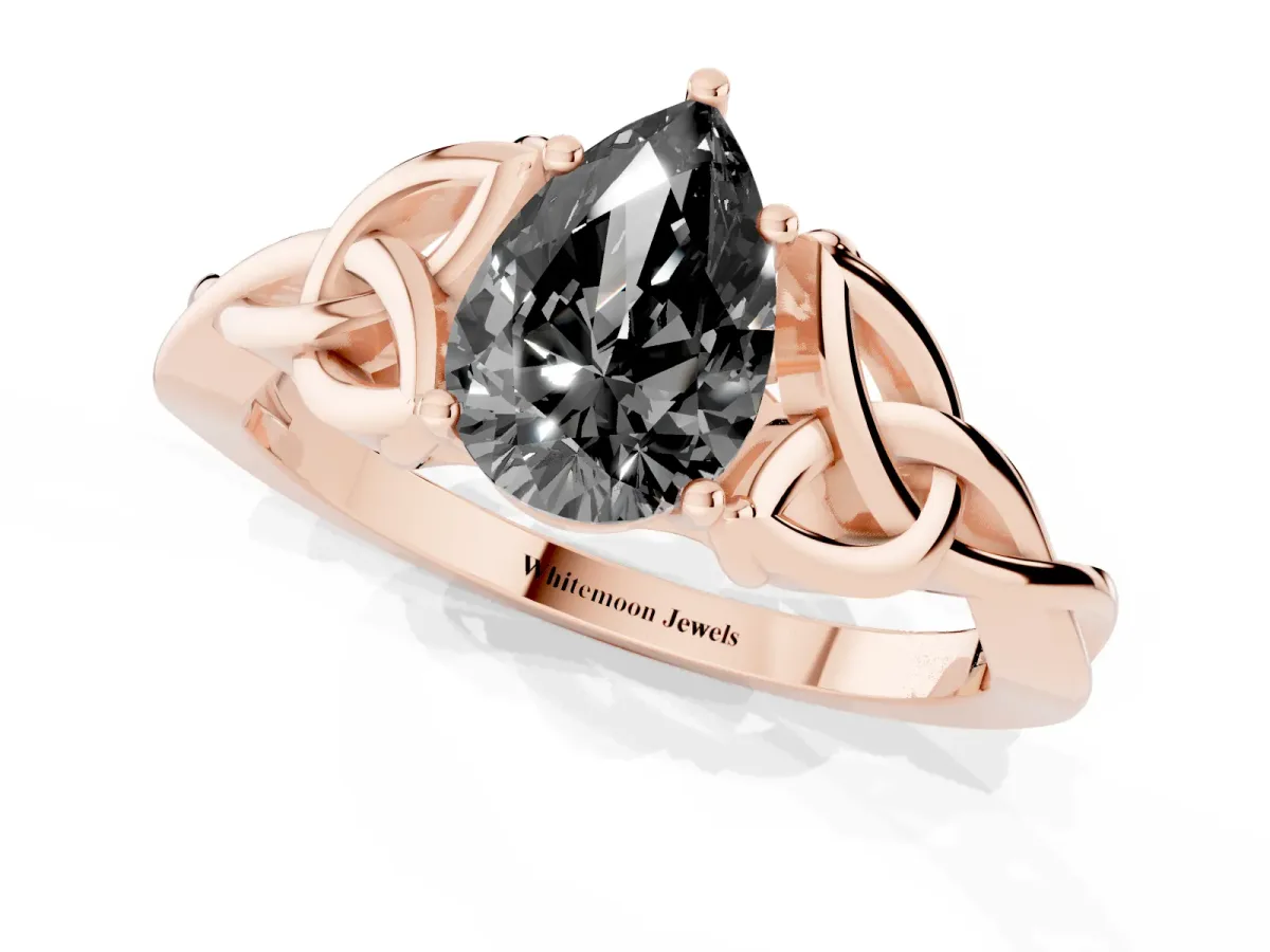 Fancy Black Pear Cut Diamond Solitaire Engagement Ring with Celtic Knot Band and Four-Prong Setting Rose gold