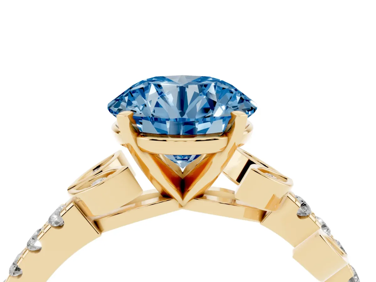 Fancy Blue Round Cut Solitaire Leaf-Inspired Diamond Ring with Pavé Band and Four-Prong Setting Yellow gold