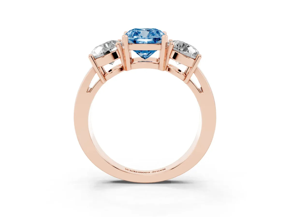 Fancy Blue Three-Stone Cushion Cut Diamond Ring with Round Side Stones, Classic Band, and Four-Prong Setting Rose gold