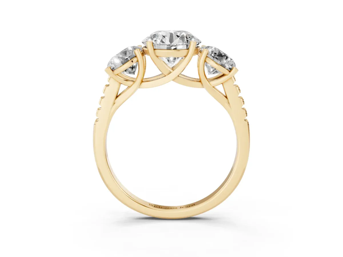 Three-Stone Round Cut Diamond Ring with Round Pavé Band and Prong Setting Yellow gold