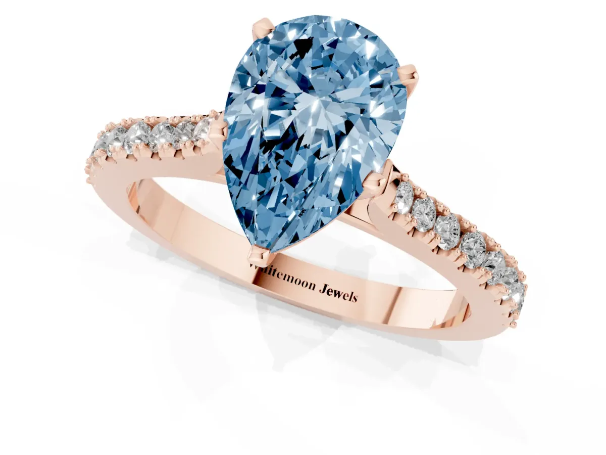 Fancy Blue Pear Cut Cut Solitaire Diamond Engagement Ring with Pave Band and Four-Prong Setting Rose gold