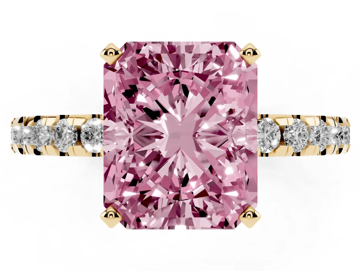 Fancy Pink Radiant Cut Diamond Solitaire Ring with Round Pavé Band and Four-Prong Setting Yellow gold