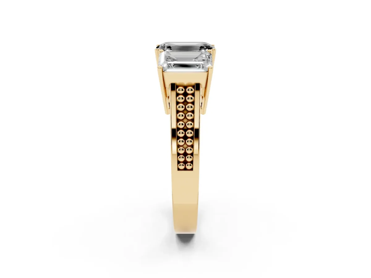 Fancy Black Emerald Cut Diamond Three-Stone Ring with Prong Setting and Textured Band Yellow gold