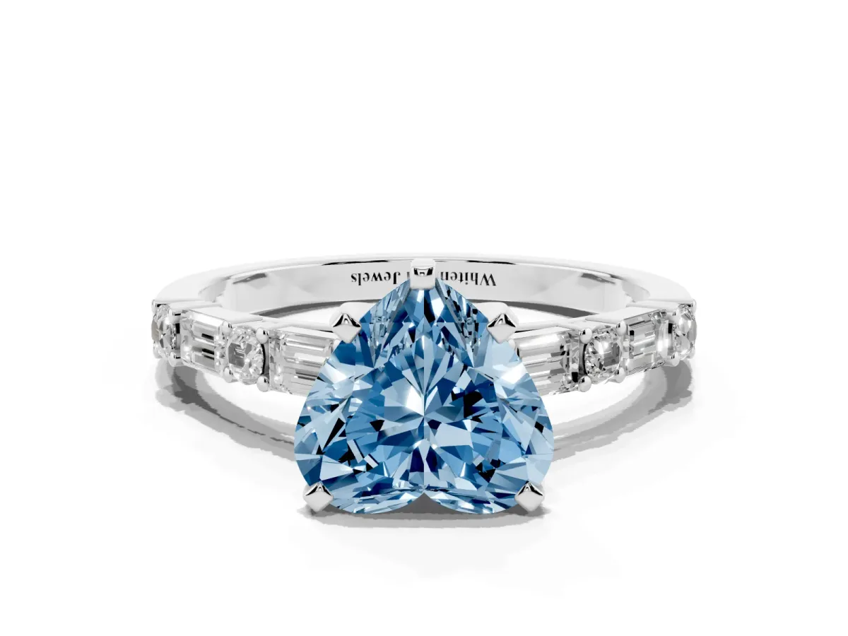 Fancy Blue Heart Cut Diamond Solitaire with Side Baguettes and Channel Set Band Silver