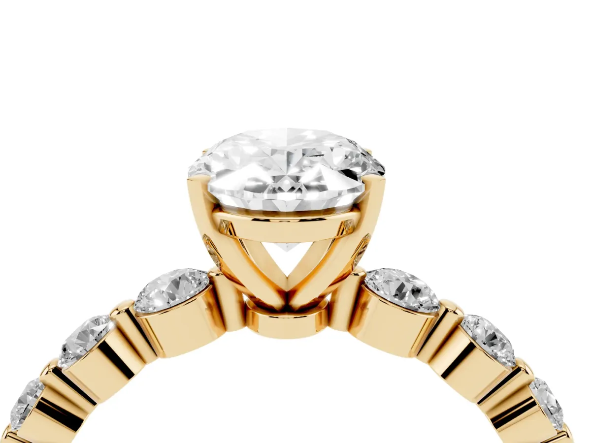 Oval Cut Solitaire Diamond Ring with Pave Band and Four-Prong Setting Yellow gold