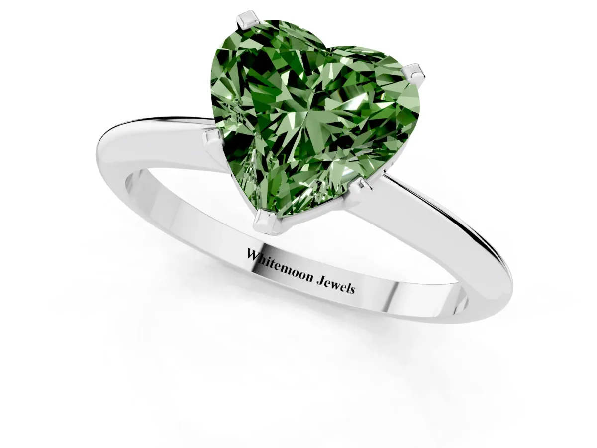 Fancy Green Heart Cut Cut Solitaire Ring with Four-Prong Setting on a Classic Band Platinum