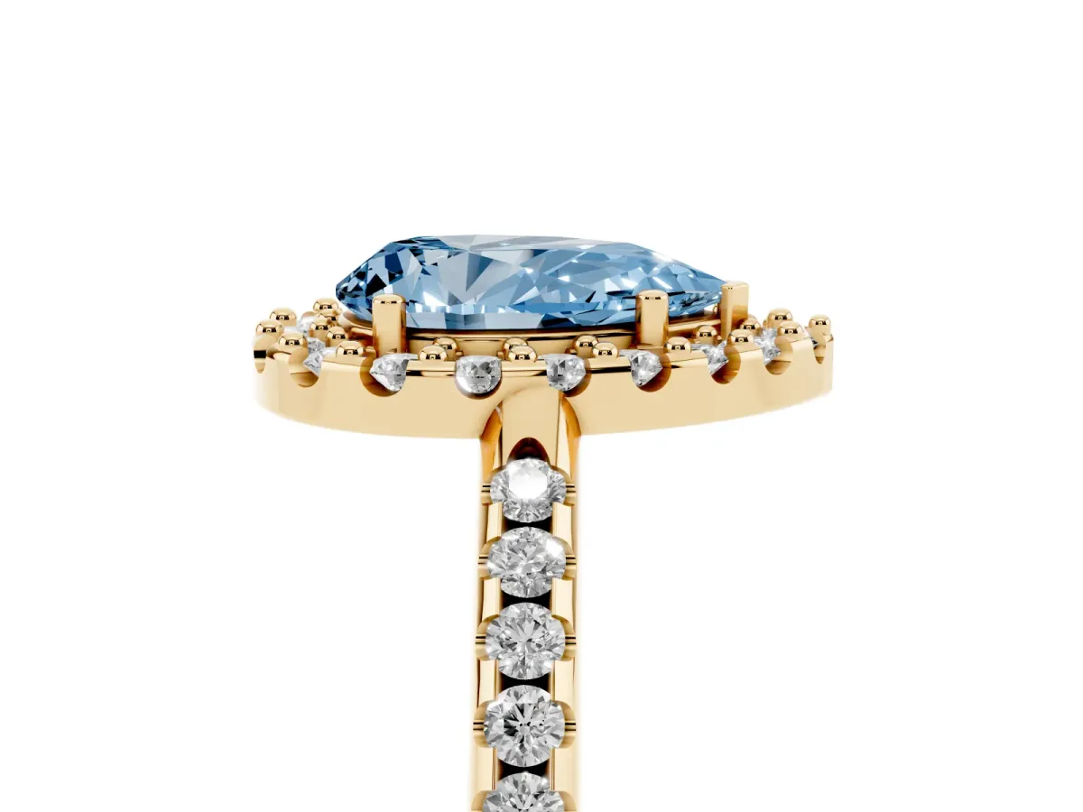 Fancy Blue Pear Cut Diamond Pavé Halo Ring with Four-Prong Setting Yellow gold