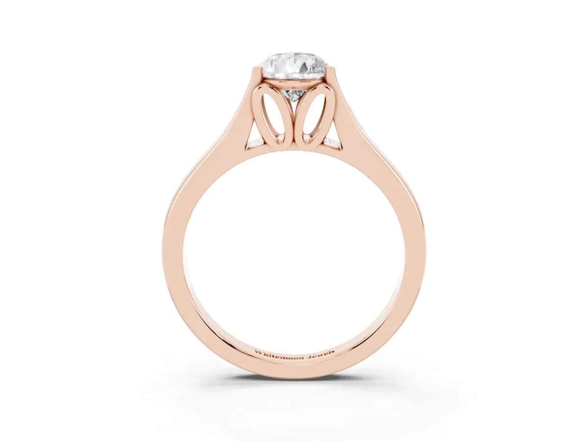 Pear Cut Solitaire Diamond Ring with Cathedral Band and Four-Prong Setting Rose gold