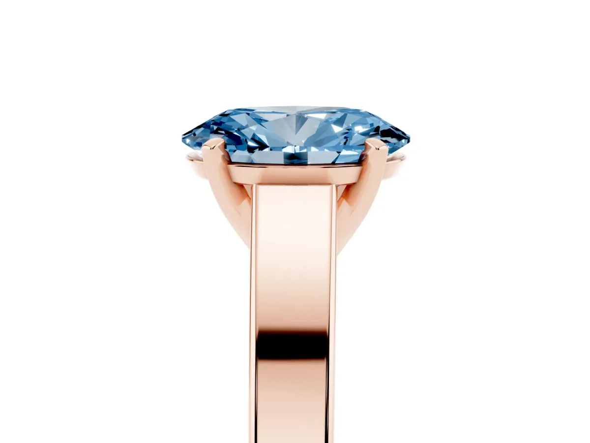 Fancy Blue Oval Cut Solitaire Engagement Ring with Four-Prong Setting and Tapered Band Rose gold