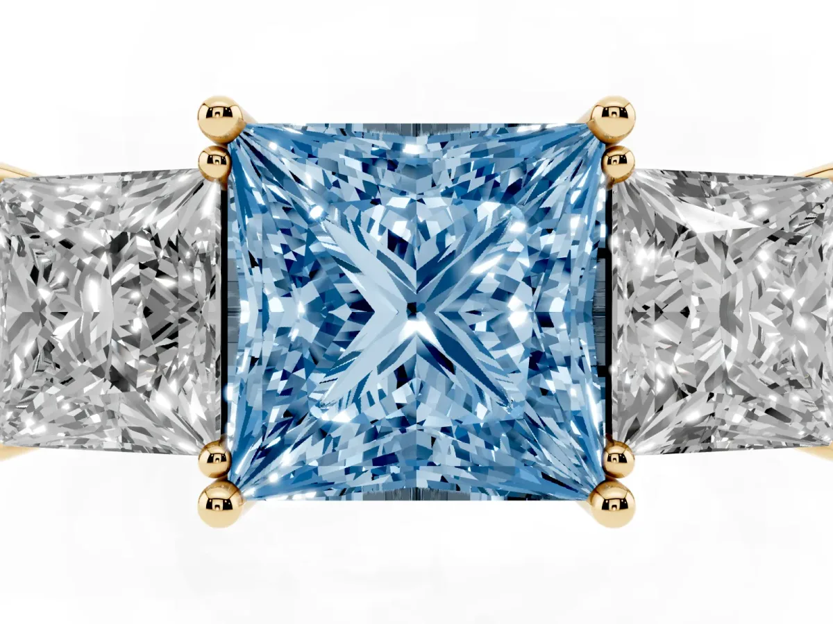 Fancy Blue Three-Stone Princess Cut Cut Diamond Engagement Ring with Prong Setting on a White Gold Band Yellow gold