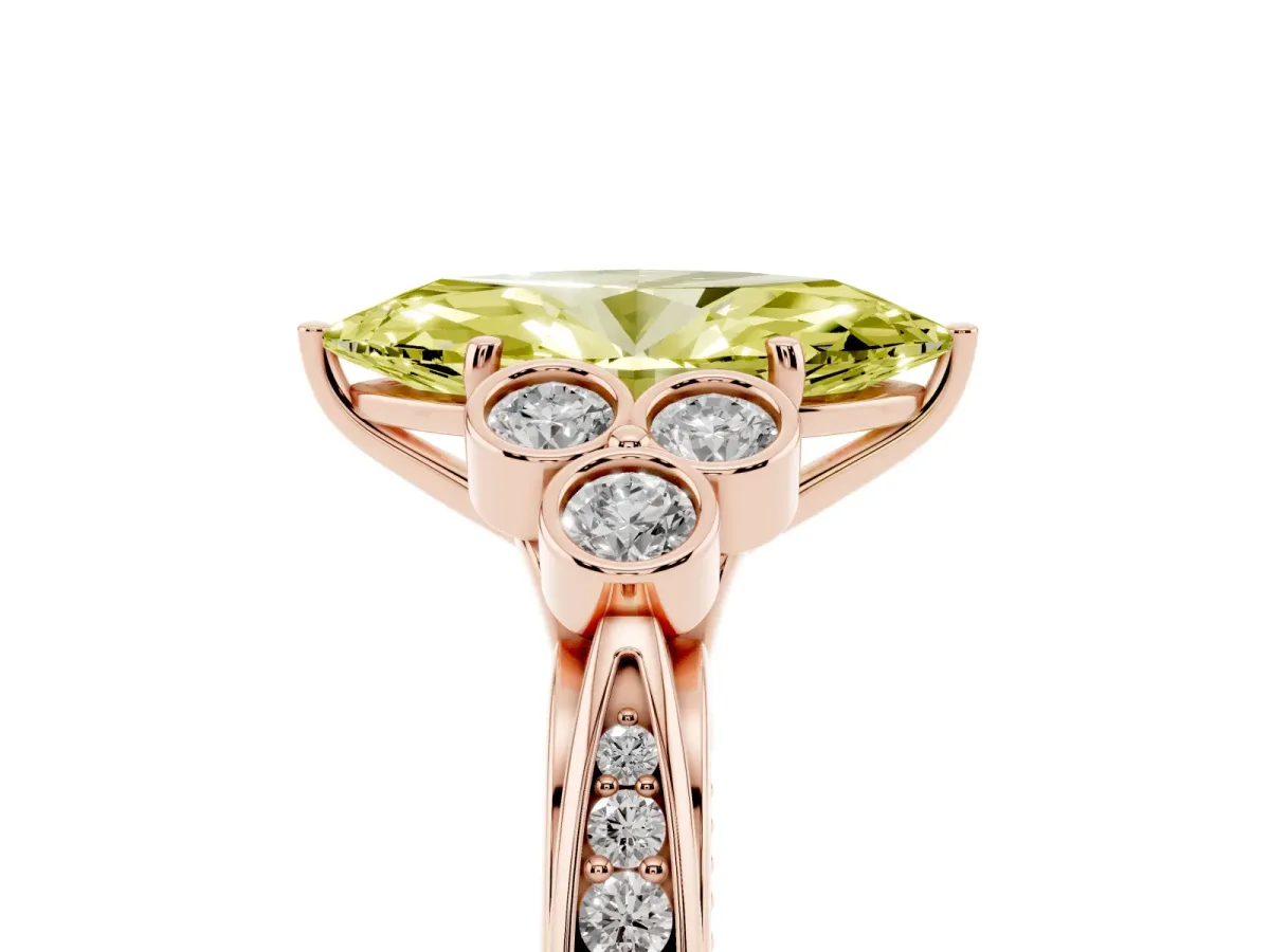 Fancy Yellow Marquise Cut Cut Diamond Engagement Ring with Bezel Set Round Side Stones and Prong Setting Rose gold