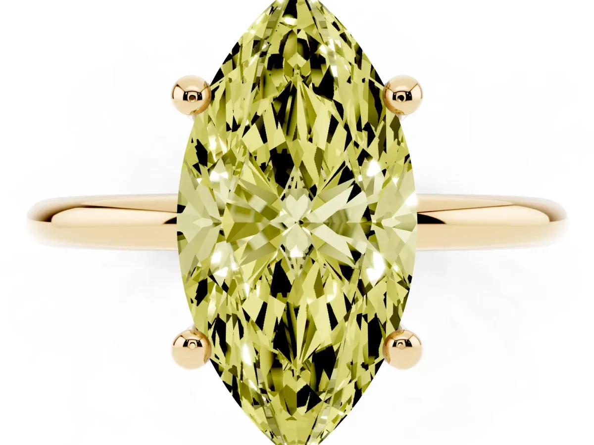 Fancy Yellow Marquise Cut Solitaire Diamond Ring with 4-Prong Setting on a Classic Band Yellow gold