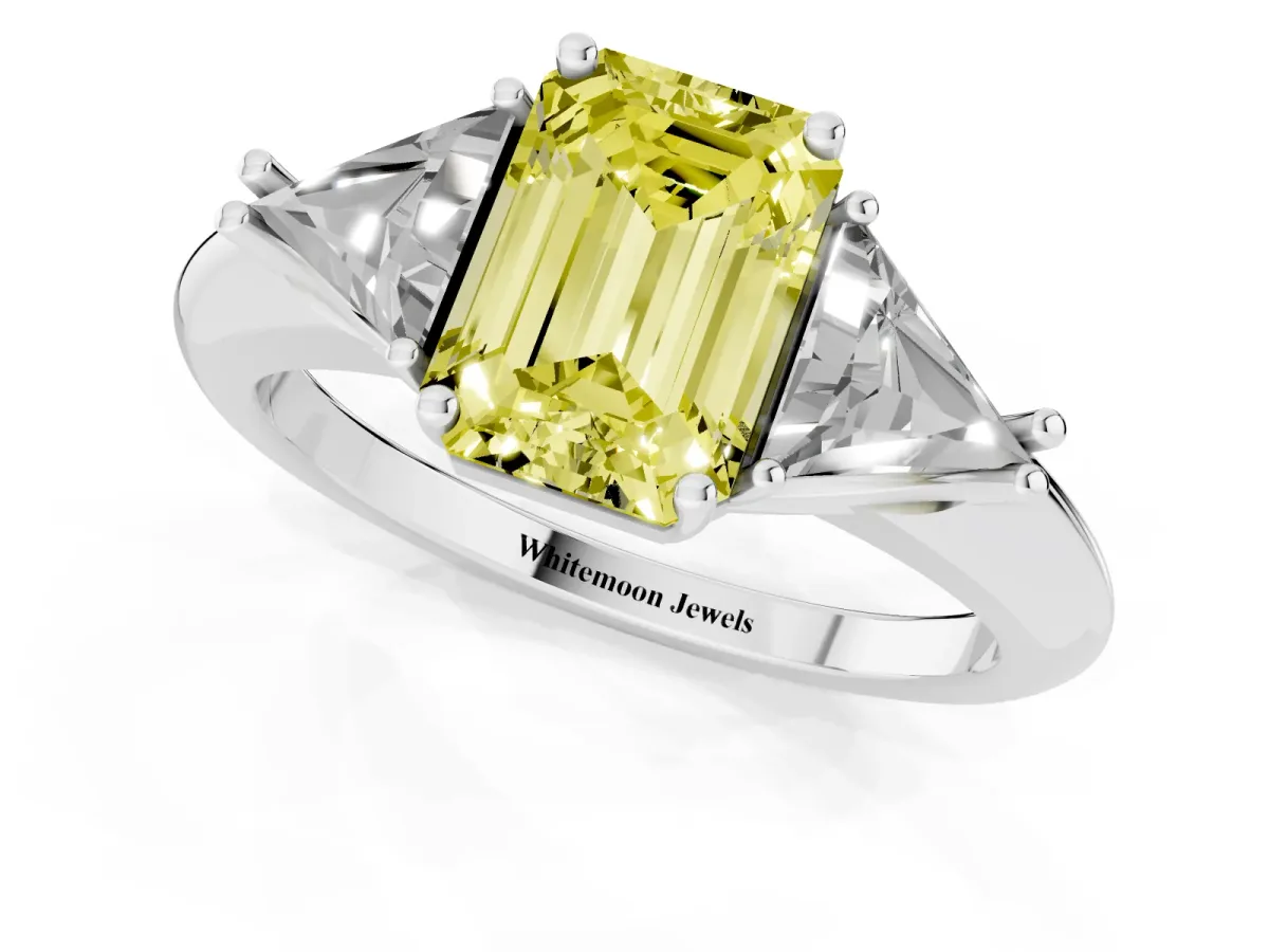 Fancy Yellow Three-Stone Emerald Cut Diamond Engagement Ring with Trillion Side Stones and Prong Setting White gold