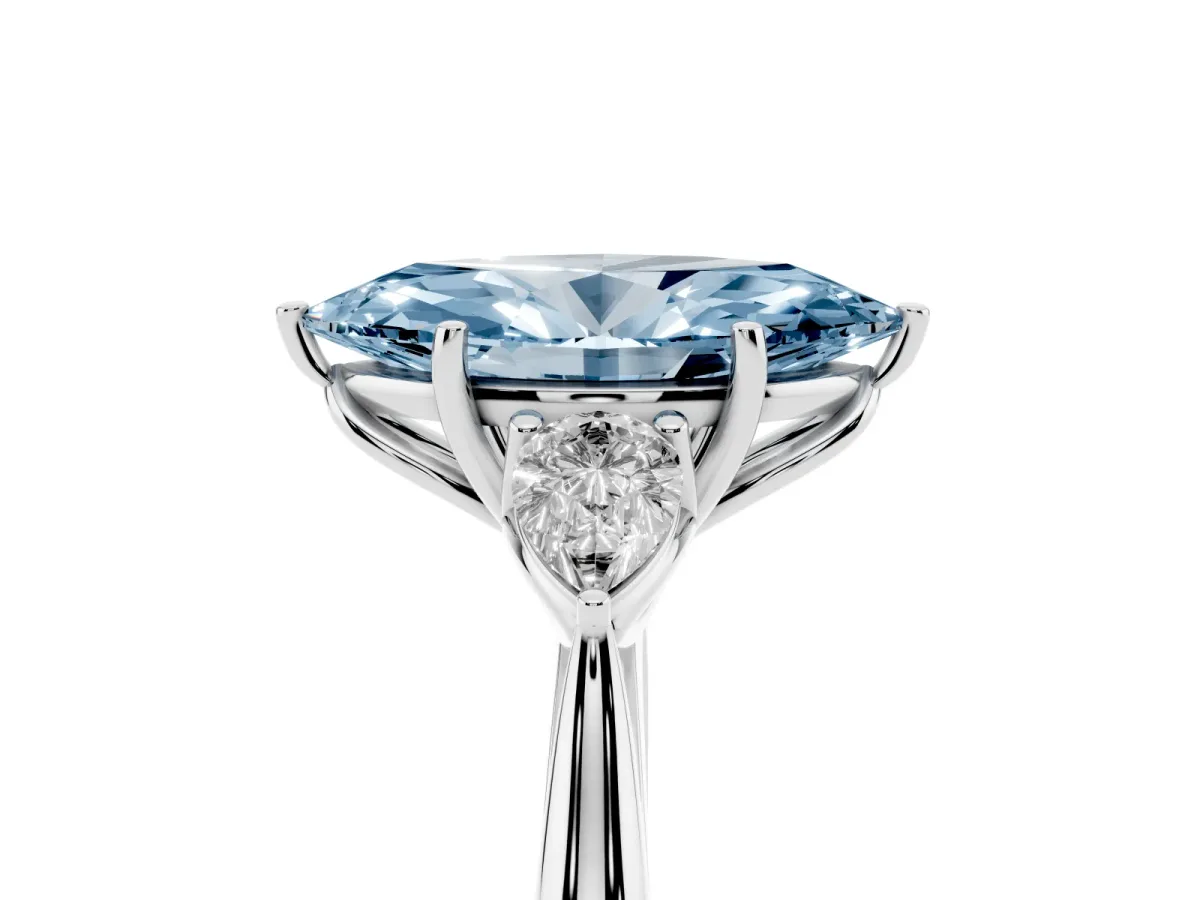 Fancy Blue Three-Stone Marquise Cut Diamond Ring with Pear Side Stones in Four-Prong Setting Silver
