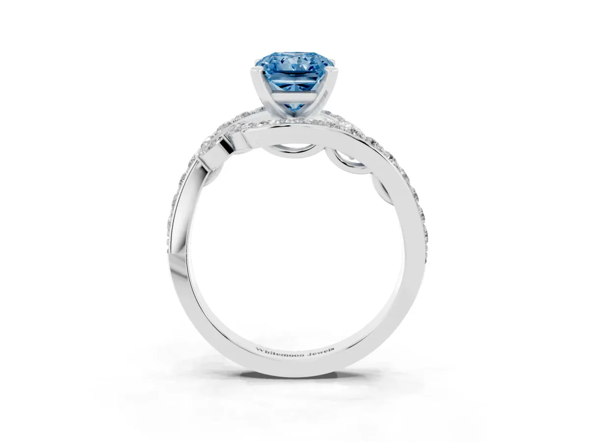 Fancy Blue Radiant Cut Solitaire with Pavé Twist Band and Four-Prong Setting Silver