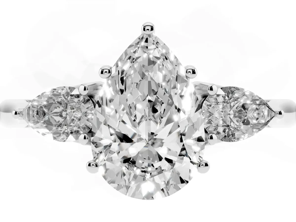 Three-Stone Pear Cut Brilliant Diamond Solitaire Ring with Tapered Band and Four-Prong Setting Platinum