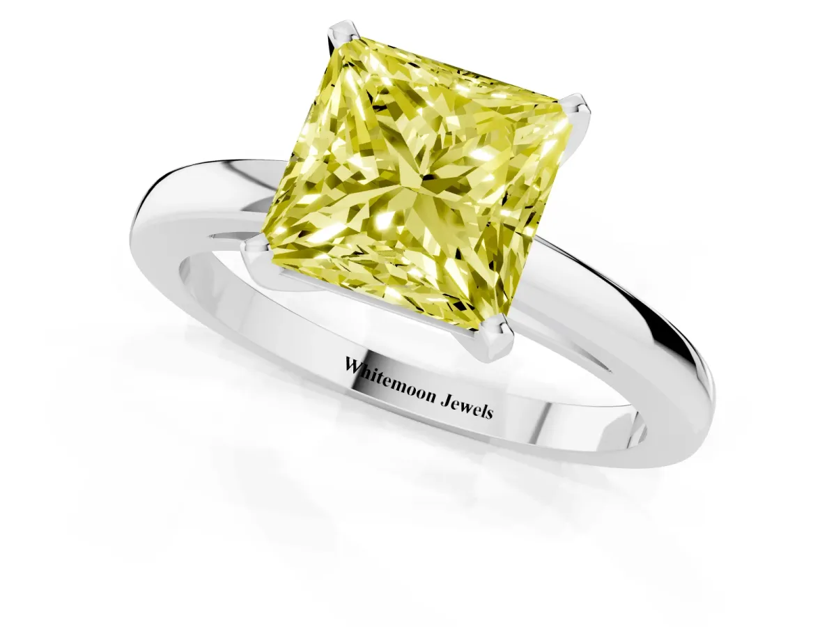 Fancy Yellow Princess Cut Solitaire Diamond Engagement Ring with Four-Prong Setting on a Classic Band Silver