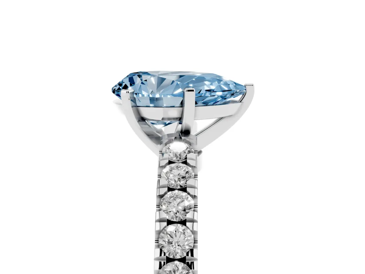 Fancy Blue Pear Cut Solitaire Diamond with Pavé Band and Four-Prong Setting Silver
